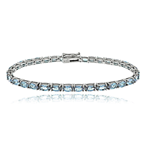 Birthstone Tennis Bracelet With CZ & Gem Accents in Sterling Silver - December Blue Topaz